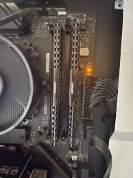 Why is my Asus motherboard flashing orange?